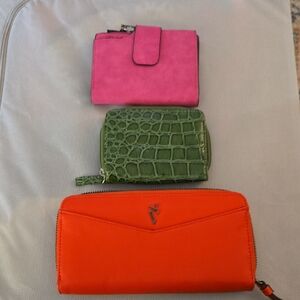 Orange Wallet with Zip Closure. Pink Wallet. Green.wallet